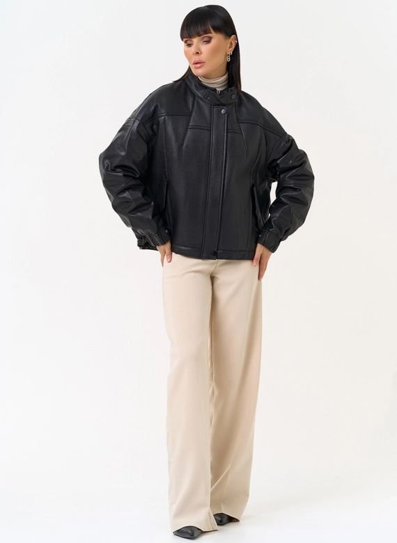 Женский пуховик из натуральной кожи черного цвета фото